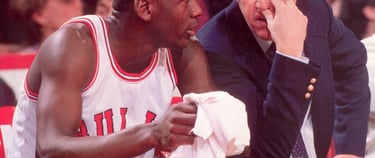 Michael Jordan (left) and Bulls Head Coach Kevin Loughery (right) pictured during the 1984-85 season