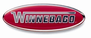 Official Winnebago logo badge in red and silver for RV branding and motorhome identification.