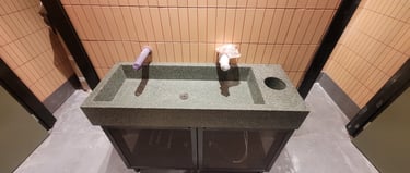 Polished concrete  sink green. Nando's