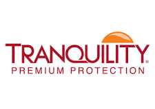 logo with tranquility premium protection in red writing and an orange sunrise behind