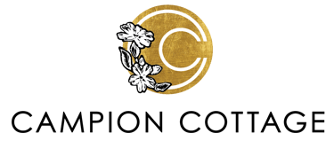 the Campion Cottage logo with a gold circular motif and lino cut campion flower