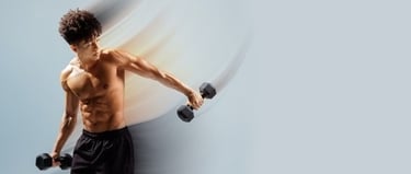 Muscular man performing lateral raises with dumbbells for shoulder strength training.