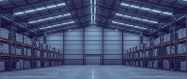 Modern warehouse interior symbolising demand forecasting, stock availability strategies, and managing supply chain variabilit