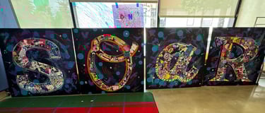 SOAR mural completed during residency with Arturo Ho at Henderson-Hopkins