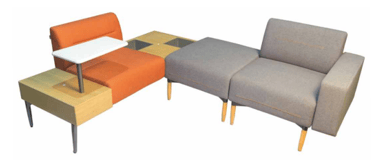 Modern modular office lounge seating with orange and gray fabric chairs, integrated side tables, and a swivel laptop tray.
