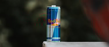 a can of soda on a skateboard