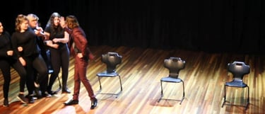 a group of people standing on a stage