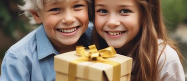 two children smiling holding a present