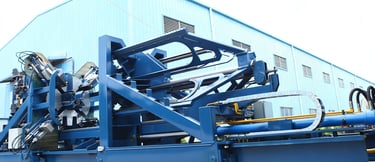 Wire rod bundling machine shown from the side in a steel plant application