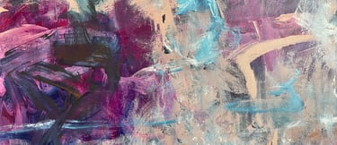 closeup of acrylic painting showing energetic strokes executed in pinks and teal on tan canvas