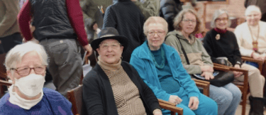 Service League members attend the Sounds Good! choir concert, December 2025