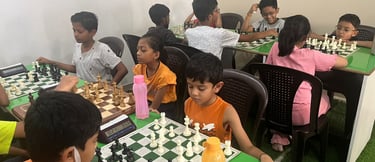 Kids playing chess at White Knight Chess Academy