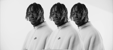 a man with dreadlocks and dreadlocks on his head