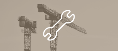 Service de maintenance de grues à tour proposé par SMD Grues, représenté par une icône de clé