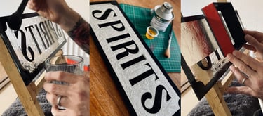 white gold leaf gilding and glue chipped glass spirits sign with black lettering