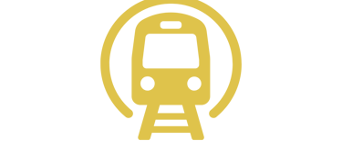 a train on a train track with a train in the background