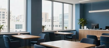 A wide shot of a modern, professional tutoring office in a Middle Eastern city, clean lines, large windows, and comfortable seating, dark blue and light blue decor.