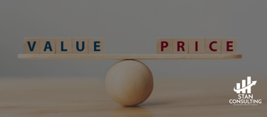 a wooden block with the words value and price