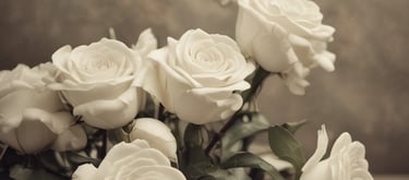 Ornate lamps with intricate cut-out patterns allow light to shine through, creating an elegant, geometric and floral design. The dark metal contrasts with the golden glow of the lights, enhancing the decorative patterns.