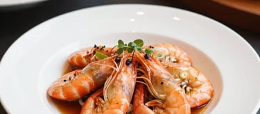 Close-up of a chef plating a gourmet pasta dish in an upscale kitchen.