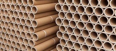 a stack of  bunch of paper tubes