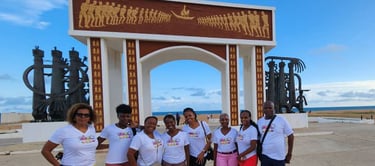 Some Haitian Diasporas Visiting the Slave Door of No Return in Ouidah in Benin 