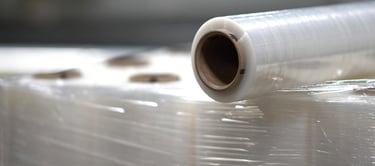 a roll - top plastic wrapper on a table