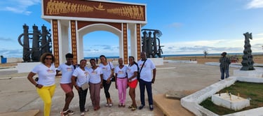 Some Haitian Diasporas Visiting the Slave Door of No Return in Ouidah in Benin 