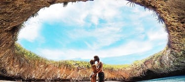 a couple kissing in a cave cave