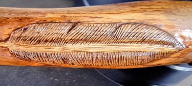 relief carved feather