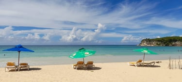 Macao Beach with turquoise water, soft sand, and Presidente umbrellas in the Dominican Republic