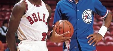 Michael Jordan (left) and Julius Erving (right) pose for a picture in the mid 1980s.
