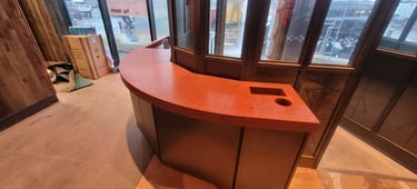 Polished concrete, red, round countertop in Nando's