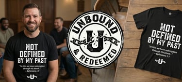 A man wearing an Unbound & Redeemed christian t-shirt featuring Ephesians 1:7 and the message Not Defined By My Past.