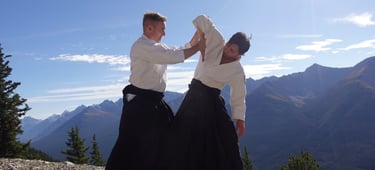 Aikidō students practicing ikkyo wrist control technique during class at Calgary Rakushinkan dojo.