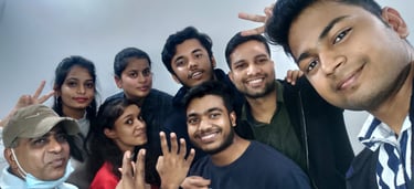 a group of people posing for a picture