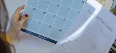 A mom creating a schedule to create content.