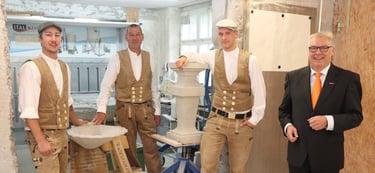 Tradition of the end-of-apprenticeship ceremony by Meister (master) Martin Weisenmayer (centre). So