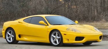 Ferrari detailed by reflections detailing given a ceramic coating paint protection as well