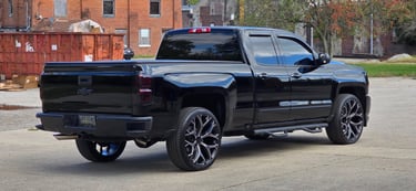 paint brought back to life on black truck by Stephen at reflections Detailing in Springfield Ohio