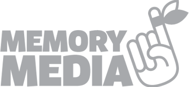 Memory Media logo features a stylized hand crossing its fingers, symbolizing hope and good luck