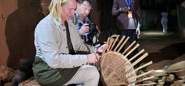 Tourist doing basket Weaving activity in Senegal