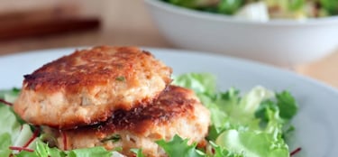 salmon prepper patty on a bed of lettuce thm s recipe