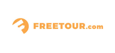 FREETOUR.com orange logo with an abstract arrow icon on a black background for travel bookings.