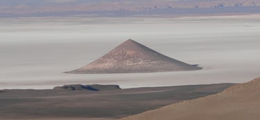 a mountain view of a mountain range with a mountain in the background cono de arita puna atacama sal
