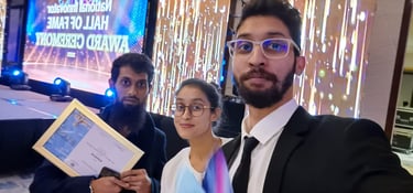 two men, one woman. trophy, award, innovation, mauritius