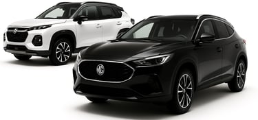 White Suzuki and Black MG SUVs parked next to each other