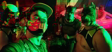 Friends posing in a club wearing pup masks.