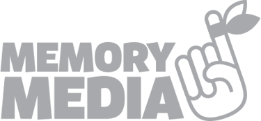 Memory Media logo features a stylized hand crossing its fingers, symbolizing hope and good luck