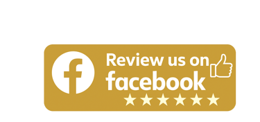 a man in a suit and tie with a thumbs up